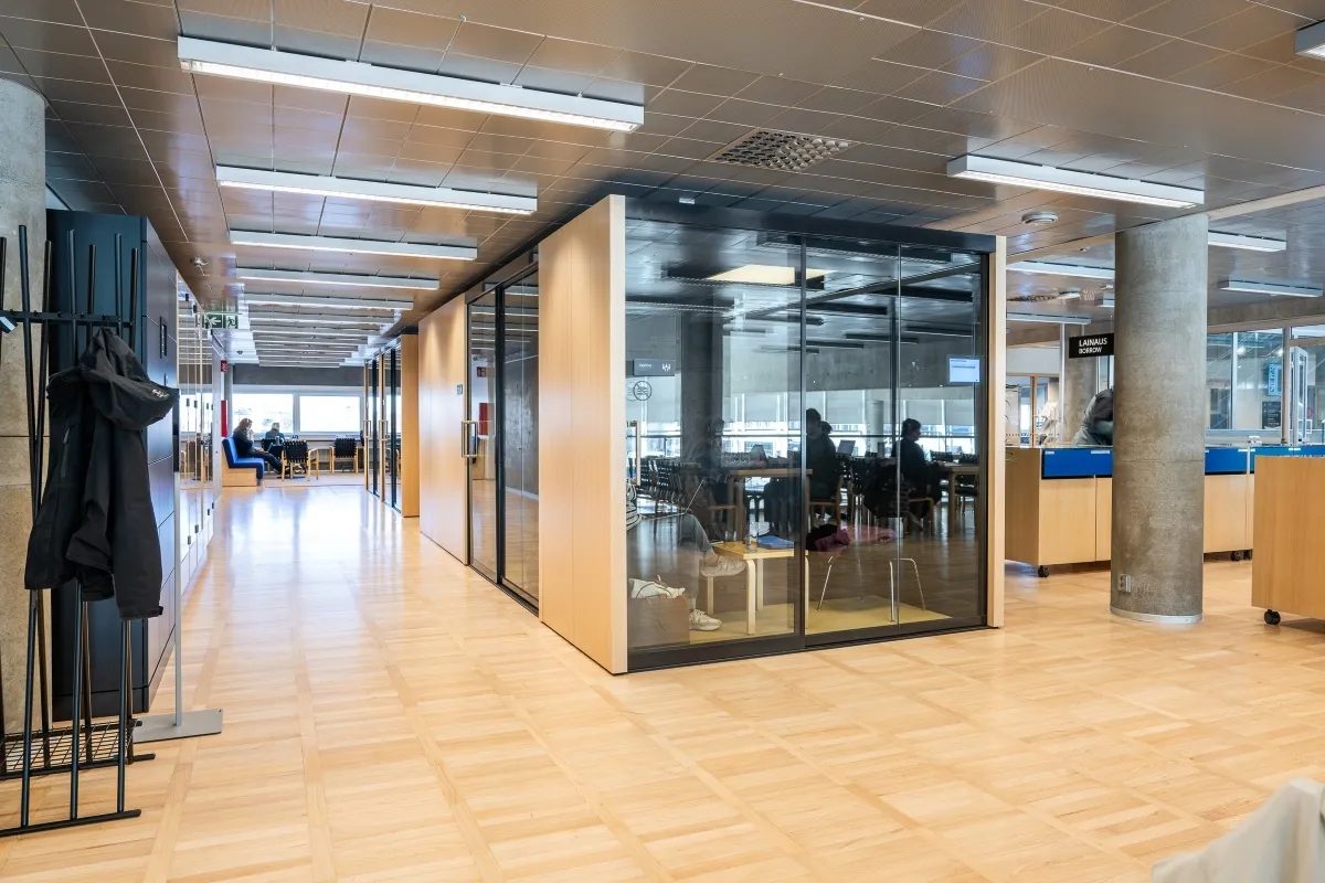 Office corridor with glass meeting rooms